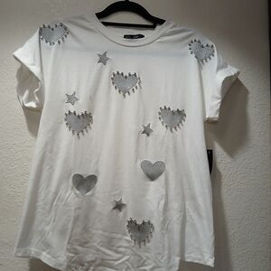 on 12 th maternity White top with Silver Heart and Star Accents